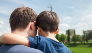 a father and son contemplate their time together and need a child custody lawyer