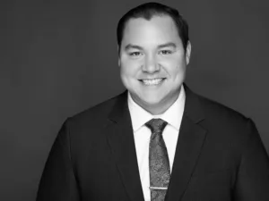 Austin M. Woo, Esq. head shot